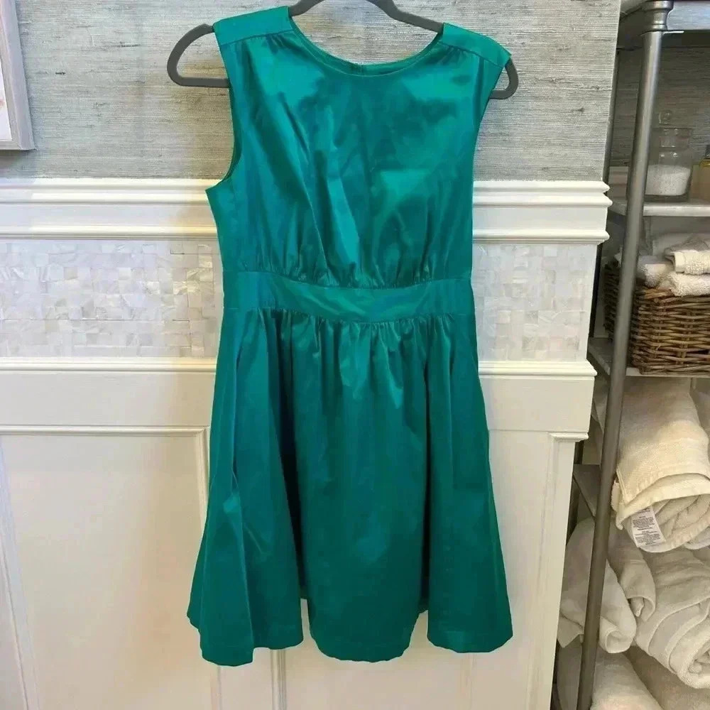 Emily and fin emerald green dress ModCloth retro pockets medium too much fun